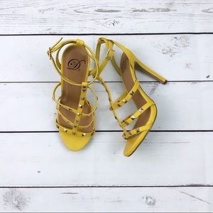 Yellow strappy heels with Silver studs. Never had a chance to wear.